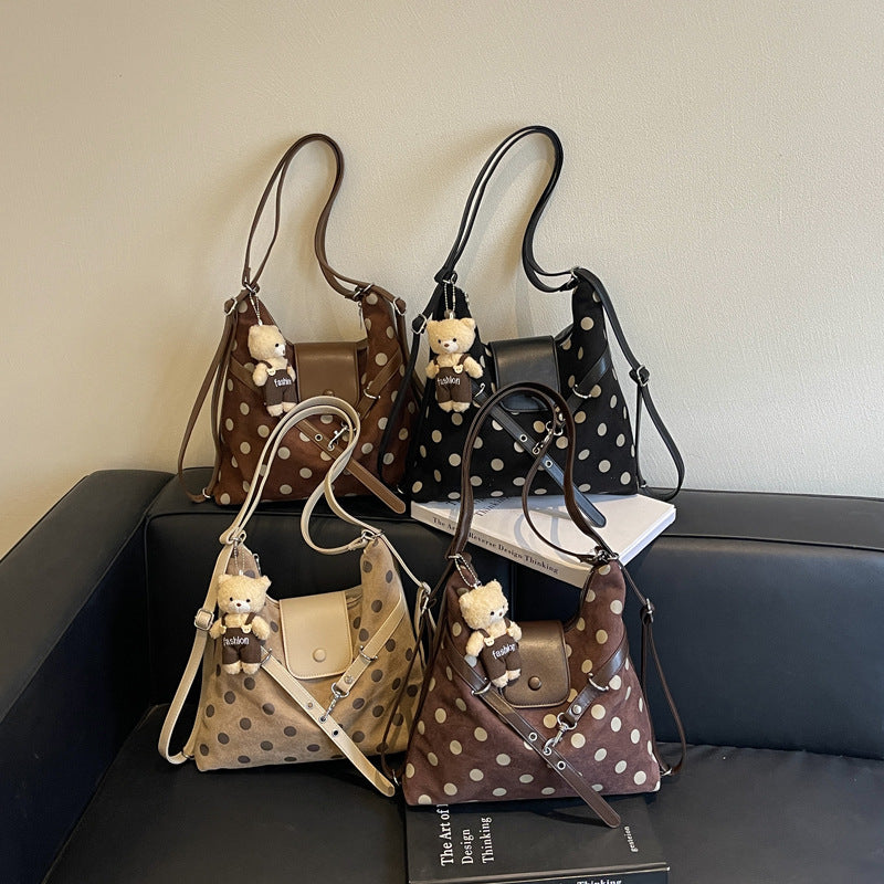 Modische gepunktete Schultertasche