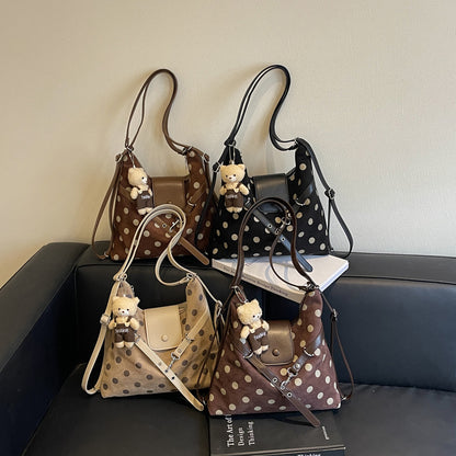 Modische gepunktete Schultertasche
