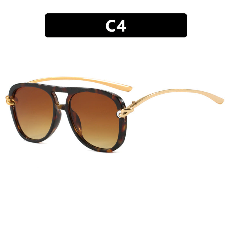 Damen sportliche Sonnenbrille mit breitem Kunststoffrahmen und UV-Schutz Brehn