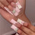 Elegante dekorative Nagelkunst-Verzierungen Brehn
