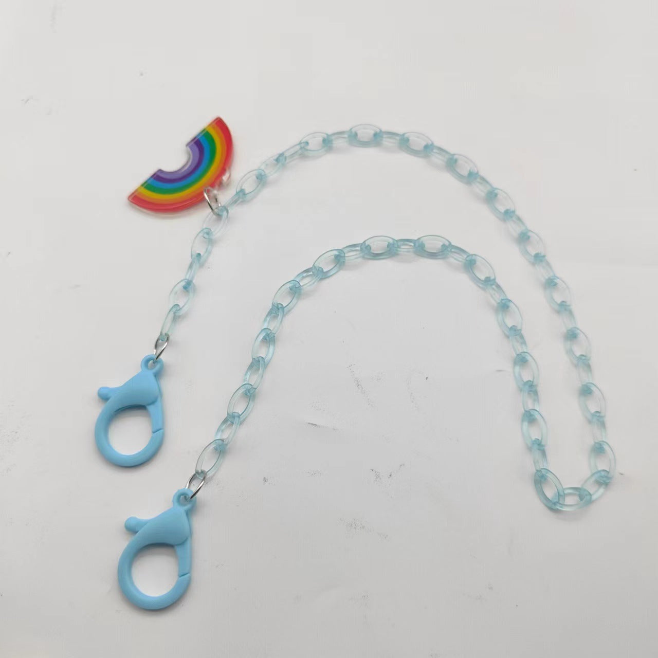 Brillenband Aus Transparentem Kunstharz mit Regenbogenanhänger Brehn
