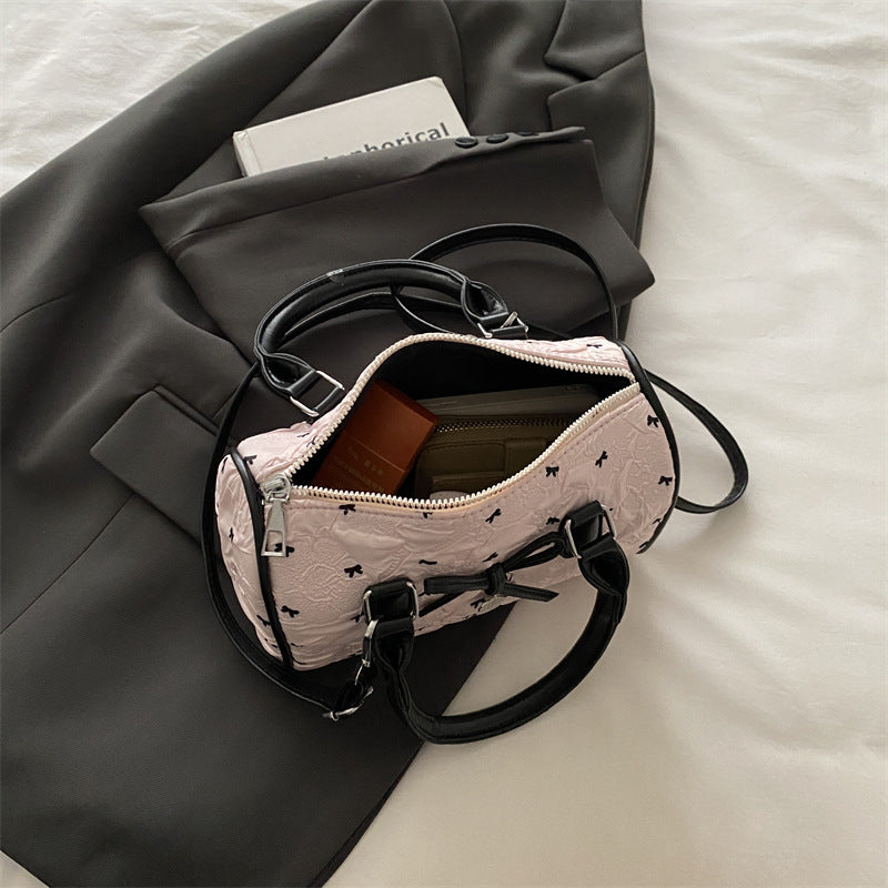 Bogen-verzierte Handtasche