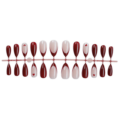Kunstnagelset mit elegantem Farbverlauf und Herzmustern Brehn