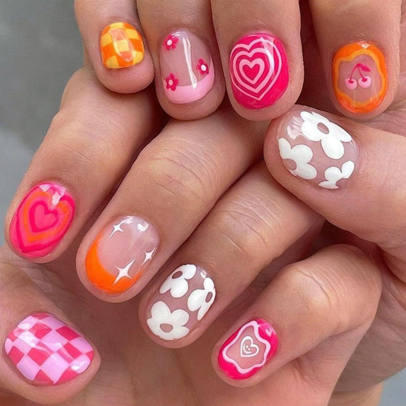 Kunstnagelset mit verspielt-romantischen Designs Brehn