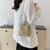 Bohemian-inspirierte gewebte Mini-Zugbandtasche Brehn