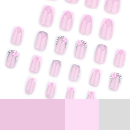 Kunstvolle Gel-Nägel mit eleganten floralem Design und Glitzerakzenten Brehn