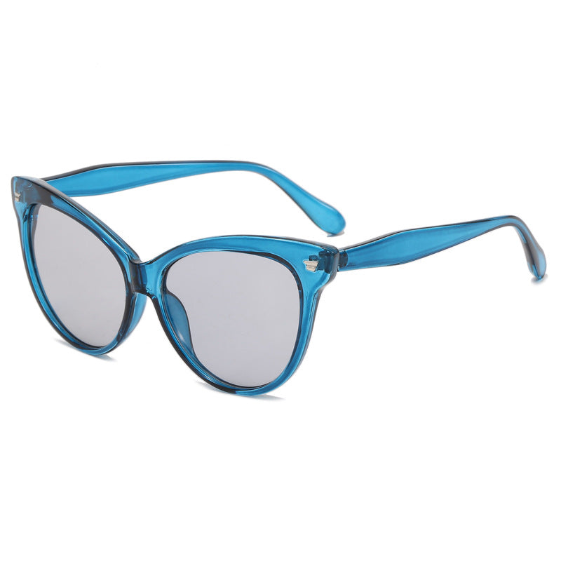 Damen modische Cat-Eye Sonnenbrille mit transparentem Rahmen und blauen Gläsern Brehn