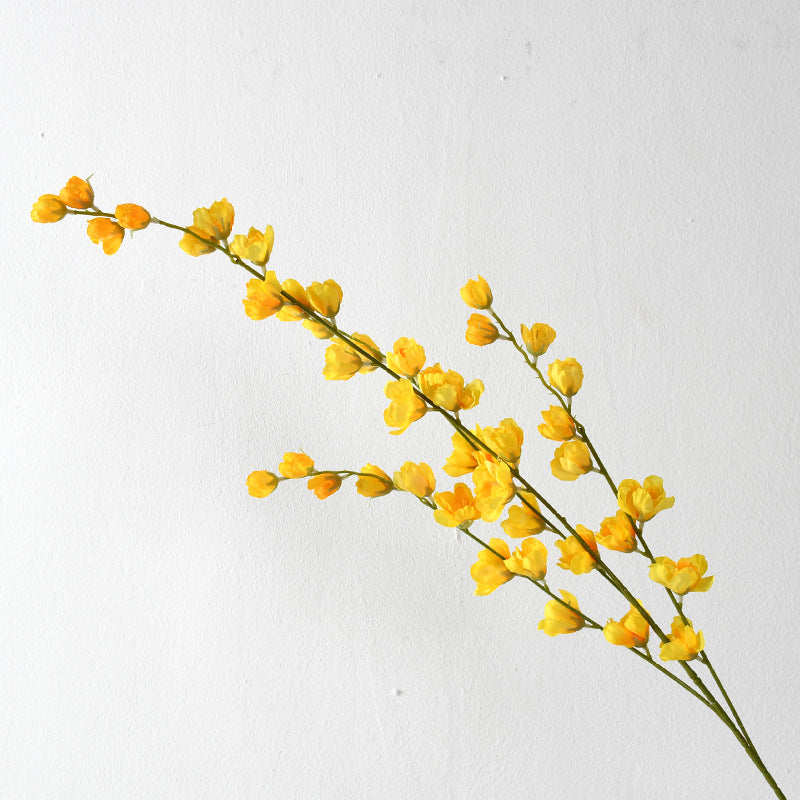 Dekorative florale Erbsenblütenstielanordnung