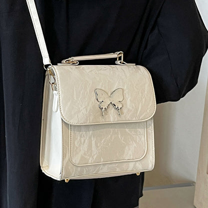 Schmetterlingsverzierte Handtasche