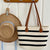 Stylische Strohtasche mit Kontrastierenden Streifen Brehn
