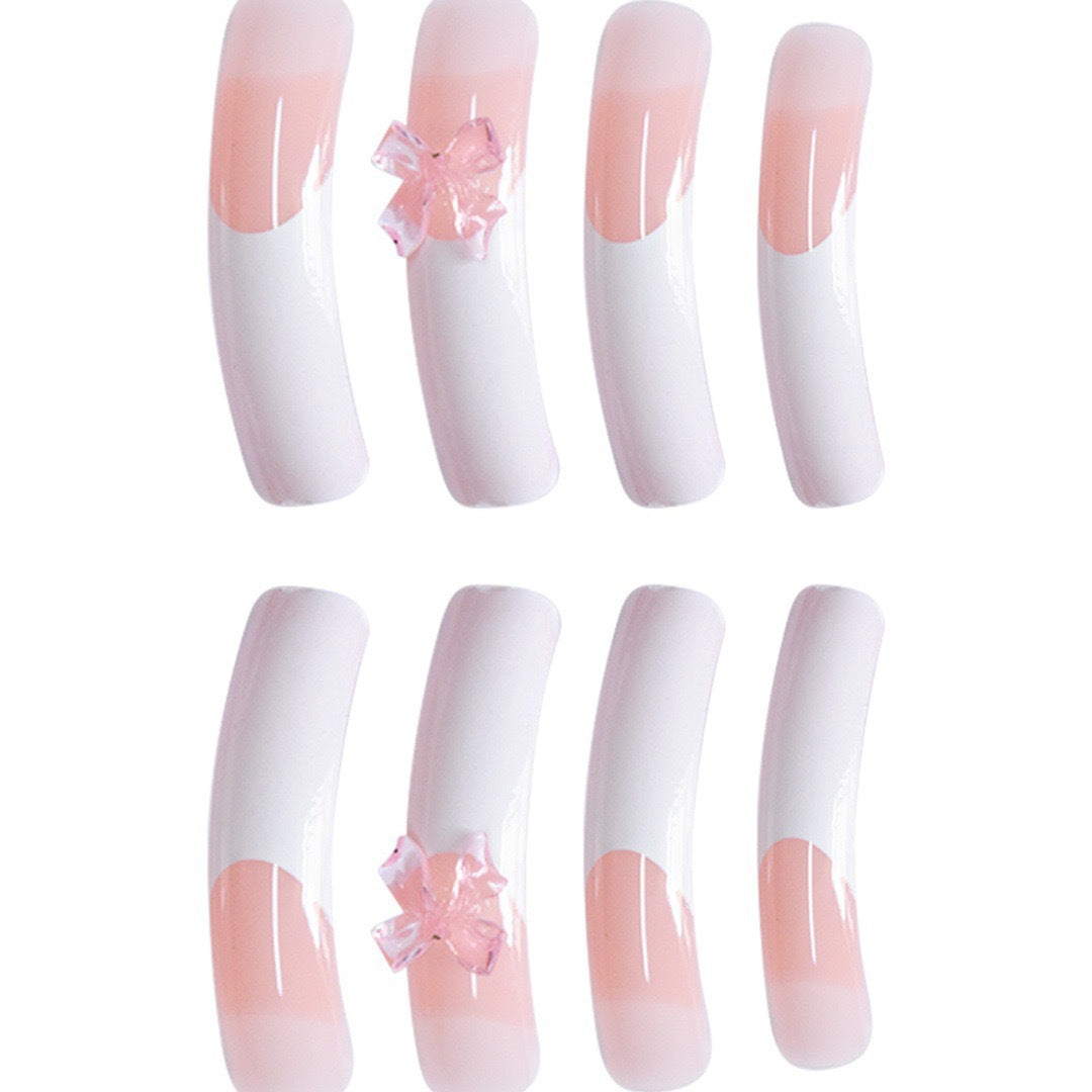 Elegante Nagelkunstverzierungen mit dekorativen Schleifenakzenten Brehn