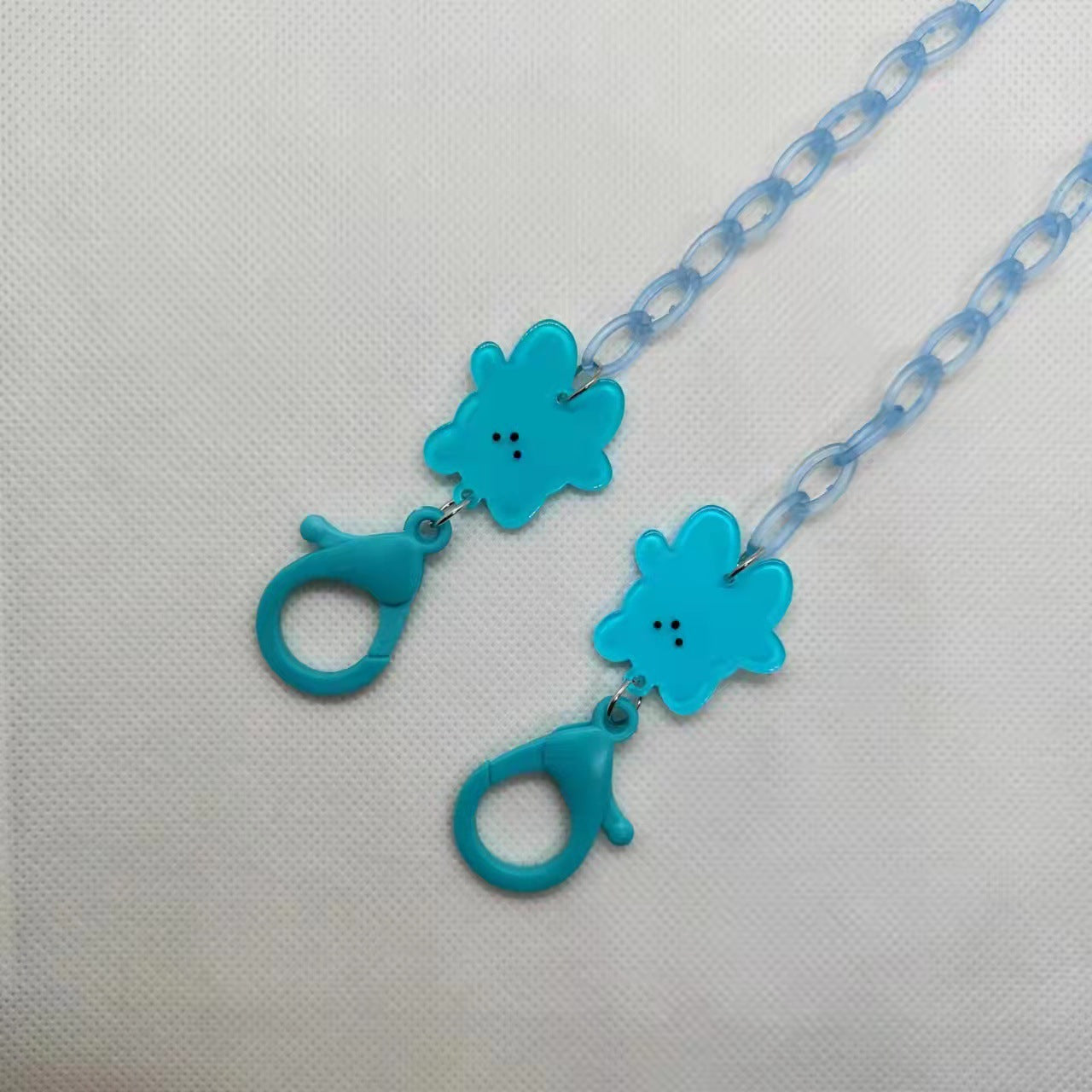 Verspielte Brillenhalterkette mit Blumenmotiv Brehn