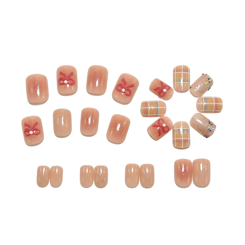 Kreatives Kunstnagelset mit Glitzer und Blumenapplikationen Brehn
