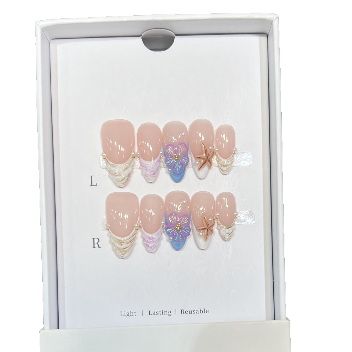 Künstlerisches Press-On Nagelkunst Set mit floralem und Seestern Design Brehn