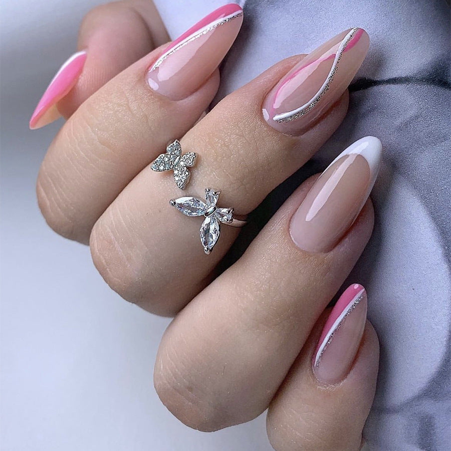 Elegantes Press-On-Nagelkunst-Set mit Schmetterlings- und Glitzerelementen Brehn