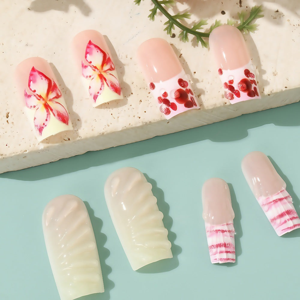 Kunstnägel Set mit eleganten floralen Designs Brehn