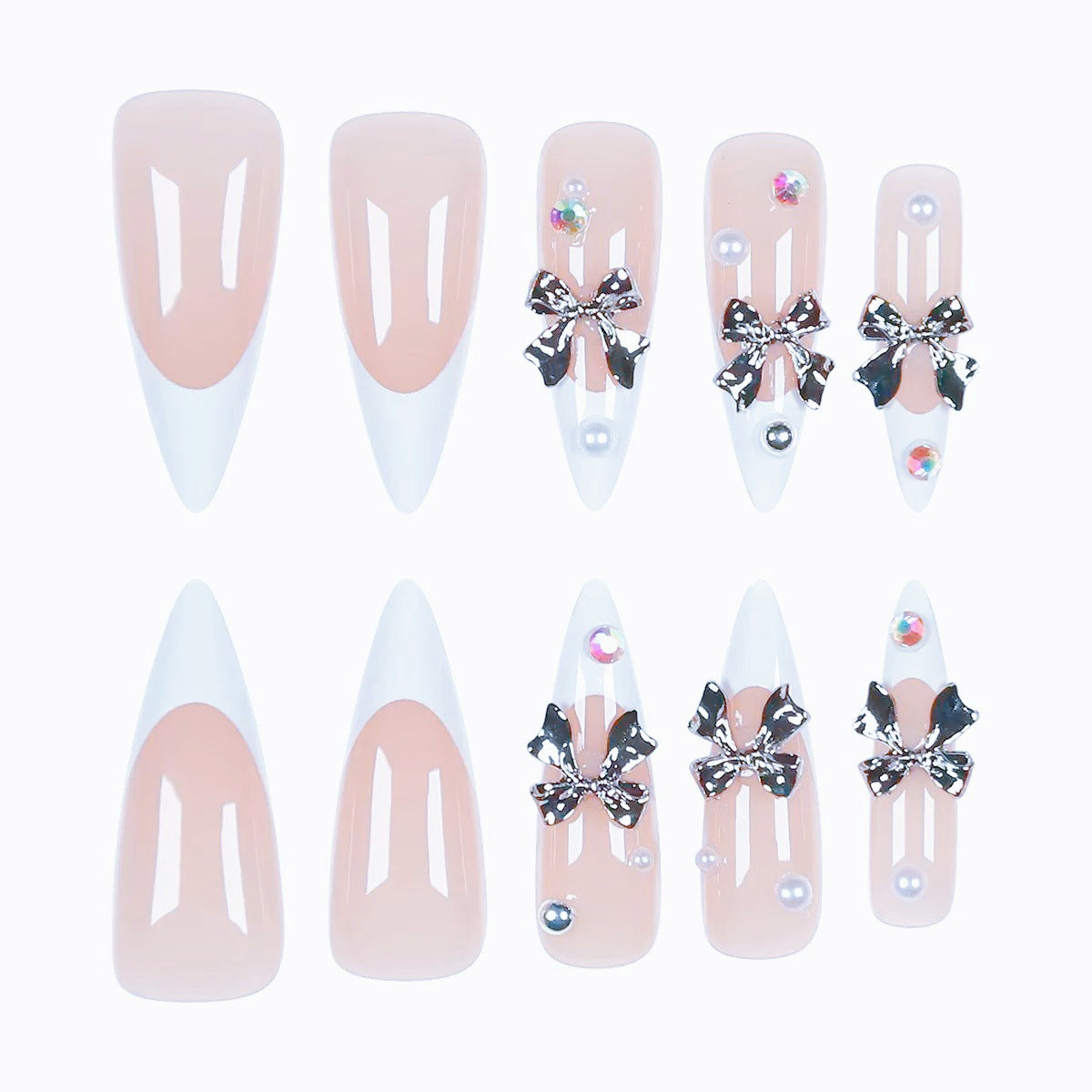 Kunstnagelset mit eleganten Schleifen und funkelnden Akzenten Brehn