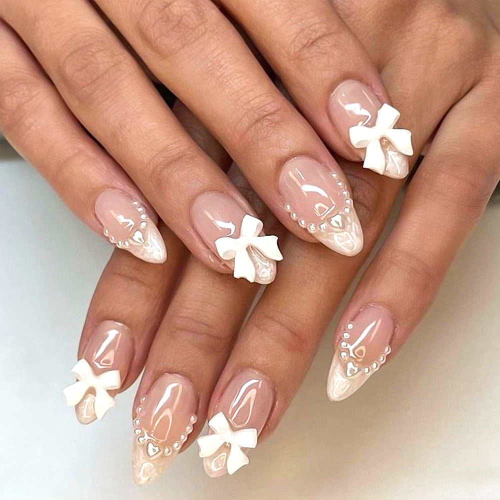 Dekorative Press-On-Nageltips mit Schleifenakzenten Brehn