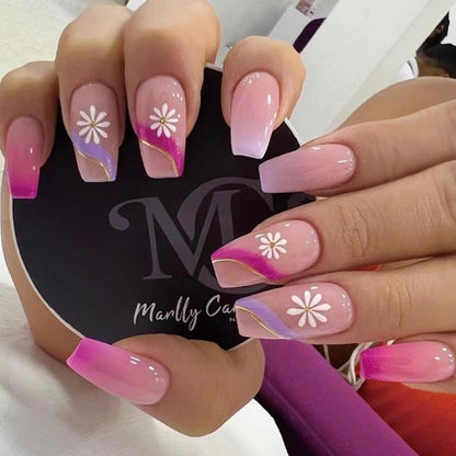 Kunstvolle Nagelverlängerungen mit buntem Ombre-Design und floralen Akzenten Brehn