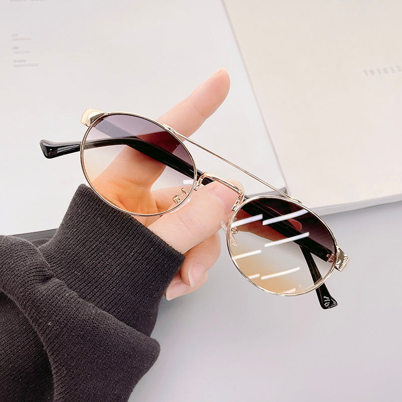 Damen modische Sonnenbrille im stilvollen runden Design mit goldenen Akzenten Brehn