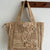 Handgefertigte Strohtasche mit Floralen Details Brehn