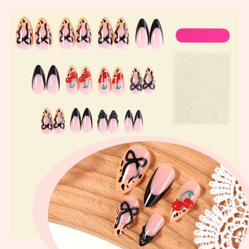 Kreatives Nagelkunst Press-On Set mit Schleifen- und Kirschdesigns Brehn