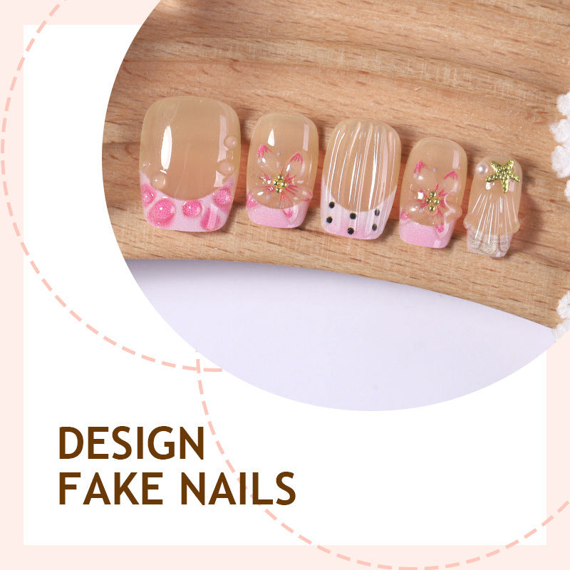 Kunstnagelset mit floralen Akzenten und glamourösen Dekoren Brehn
