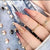 Künstlerisches Stiletto Press-On Nagelset mit Ombré Design Brehn