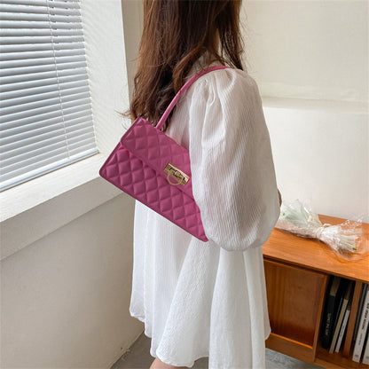 Elegante gestepptes Handtasche