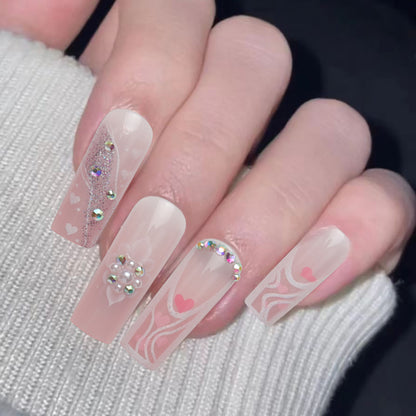 Dekoratives Press-On-Nagelset mit Herz- und Edelsteinakzenten Brehn