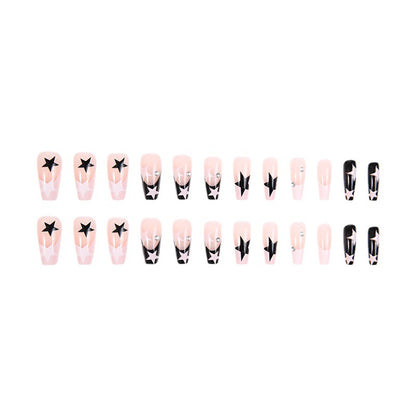 Kunstnagelset mit glamourösem Sternen-Design und funkelnden Akzenten Brehn