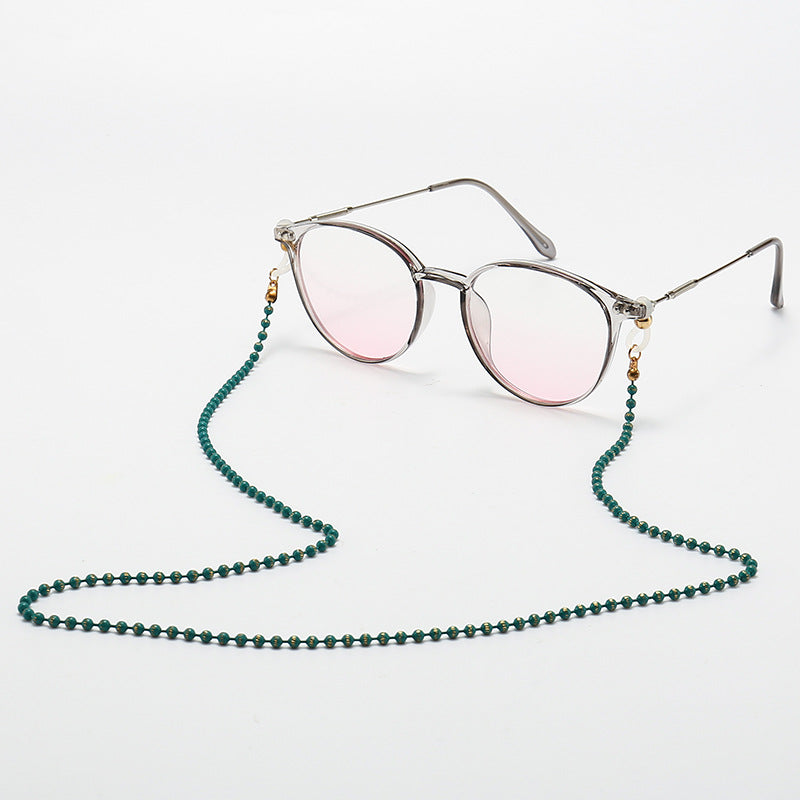 Modische Katzenaugenbrille mit Perlenkette Brehn