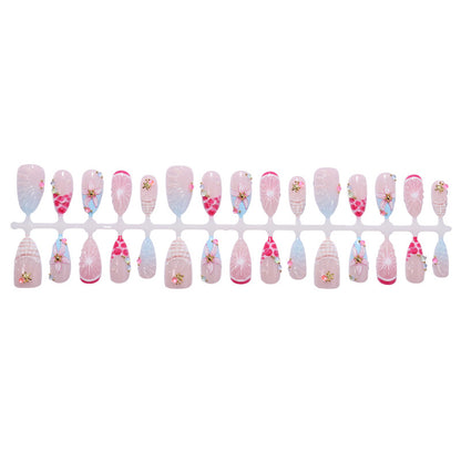 Kunstnagelset mit floralen und glitzernden Designs Brehn