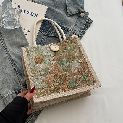Blumenbestickte Tragetasche