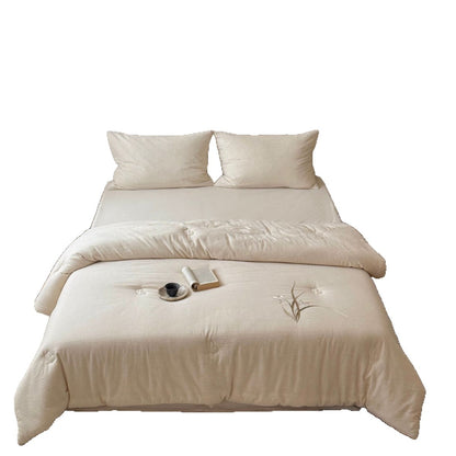 Gestepptes Baumwoll-Steppbett mit zarter Blumenstickerei