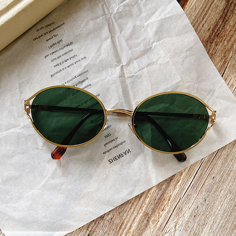 Runde Sonnenbrille mit Goldenen Akzenten Brehn