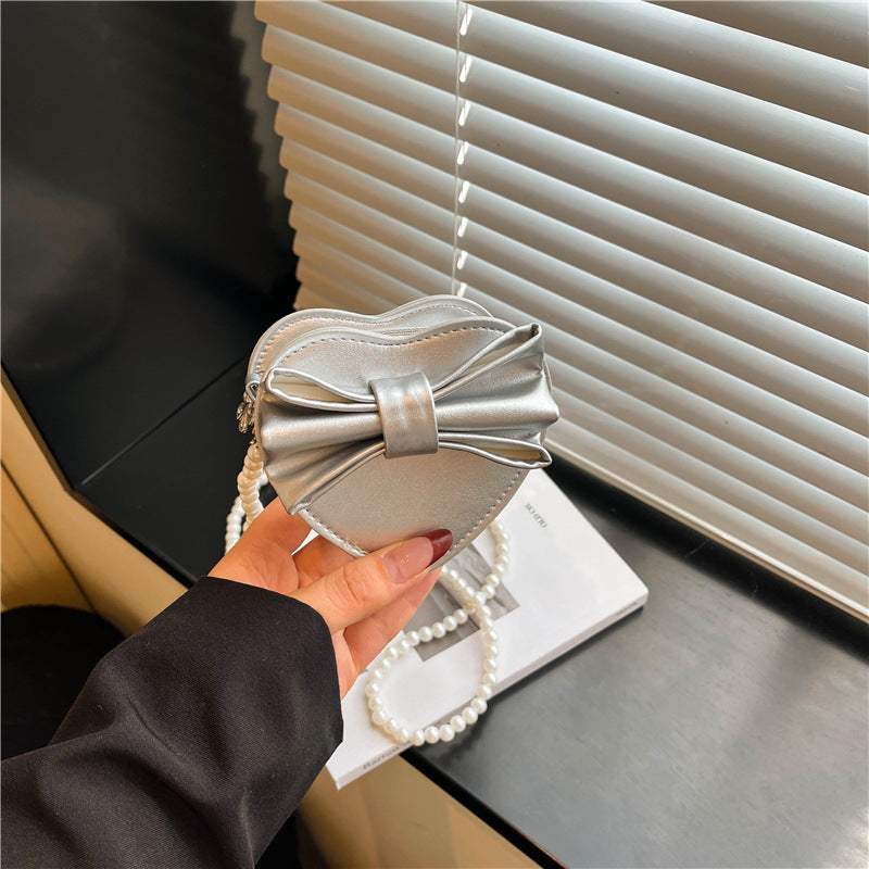 WoHerzförmige Schleifen-Clutch Tasche Brehn