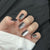 Kunstnagelset mit Glamourösem Ombre-Effekt und Glitzerverzierungen Brehn