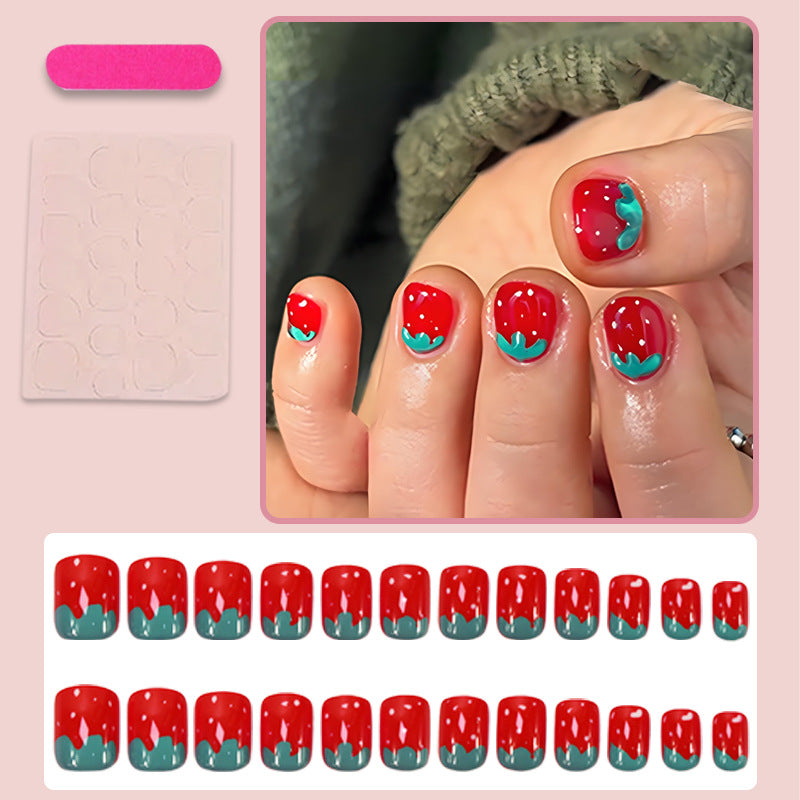 Kunstnagelset mit fröhlichen Erdbeerdesigns Brehn