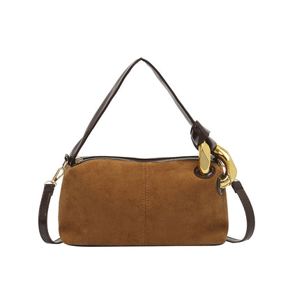 Elegante Wildleder-Handtasche mit goldenen Akzenten