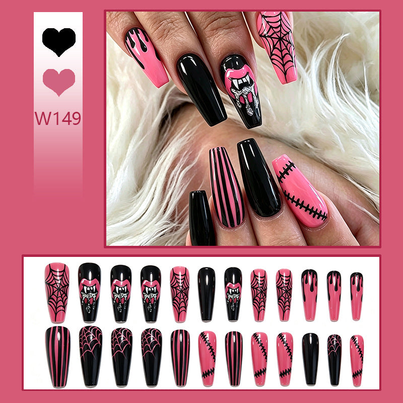 Kreatives Kunstnagelset mit Halloween-Motiven und funkelnden Applikationen Brehn