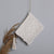 Makramee Clutch mit Quastendetails Brehn