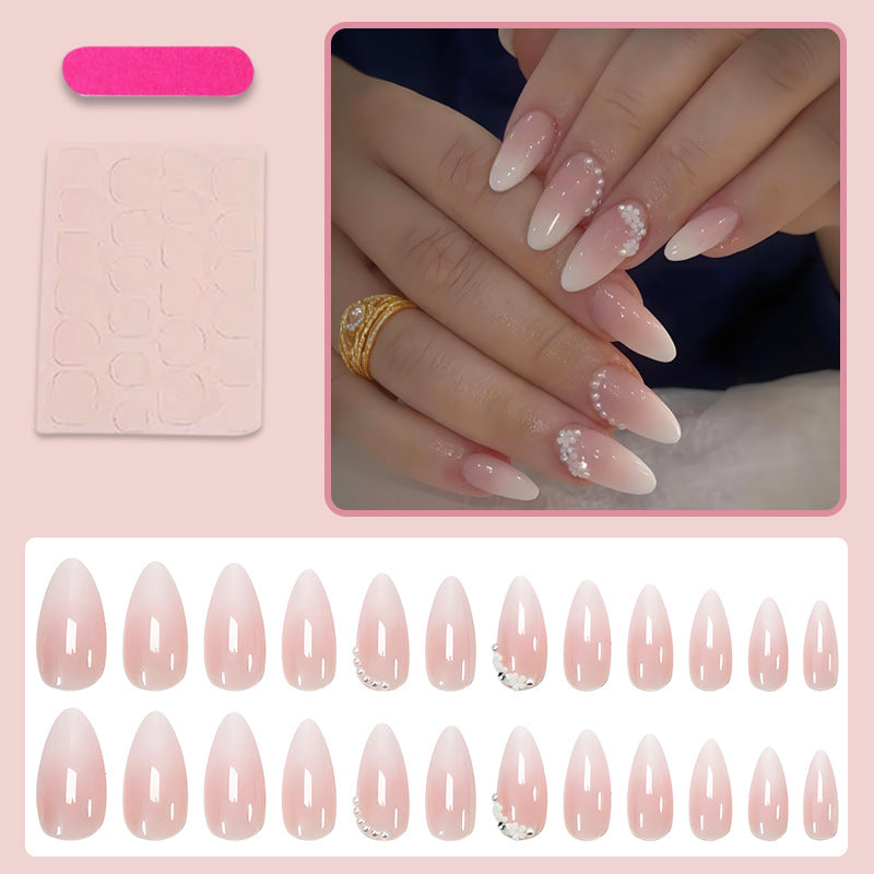 Kunstnagelset mit eleganten Ombre-Effekten und Glitzerakzenten Brehn