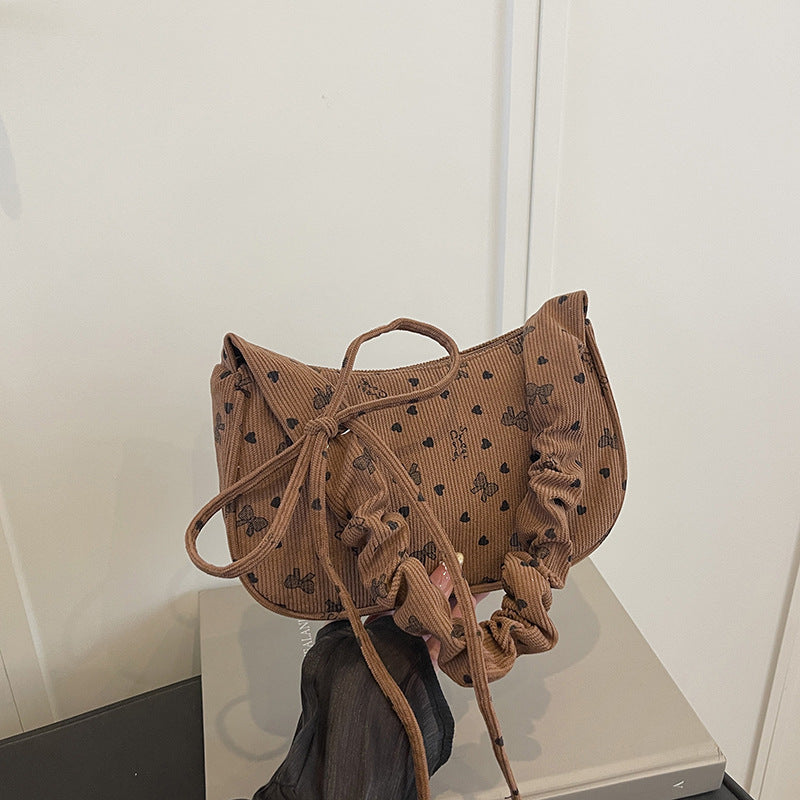 WoPlayful gemusterte Mini-Handtasche Brehn