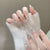 Elegantes Press-On-Nagelset mit Strassdetails Brehn