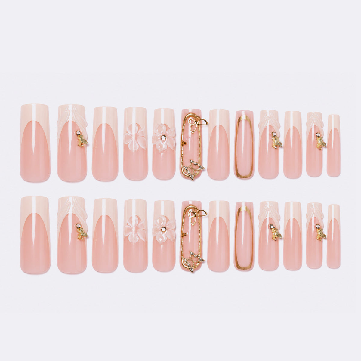 Kunstnagelset mit floralen Gravuren und eleganten Verzierungen Brehn