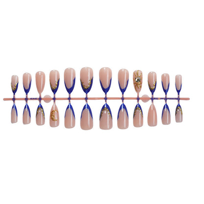 Kunstnagelset mit elegantem gold-blauen Design Brehn