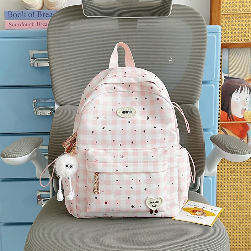 Süßer gemusterter Schulrucksack