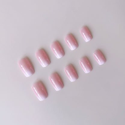 Kunstnagelset mit eleganten Ombre-Design und Glitzerakzenten Brehn
