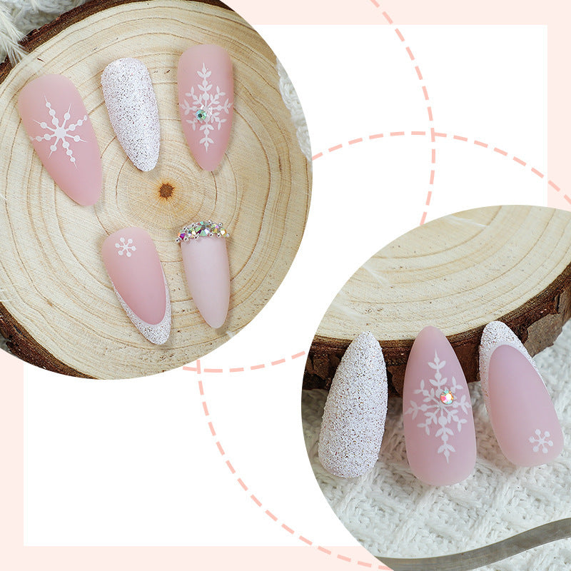 Kunstnagelset mit winterlichen Schneeflocken-Design Brehn
